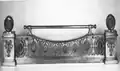 Repousse-braises en bronze doré, daté du premier quart du XIXe&nbsp;siècle.