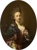Portrait en médaillon d'une jeune femme à haute coiffure, vêtue de rouge et de bleu