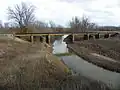 Pont ferroviaire enjambant la rivière aux Vases.