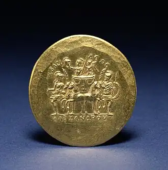 Revers d'un médaillon à l'effigie d'Alexandre et de Niké montés sur un char, flanqués de Roma et Mars.