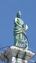 Statue de sainte Euphémie au sommet du campanile.