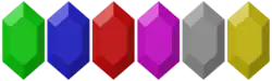 Plusieurs pierres précieuses hexagonales, de différentes couleurs.