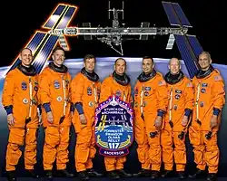 Anderson, Reilly, Swanson, Sturckow, Archambault, Forrester et Olivas