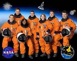 Parazynski, Wheelock, Wilson, Zamka, Melroy, Tani et Nespoli