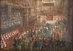 salle remplie de femmes et d'hommes