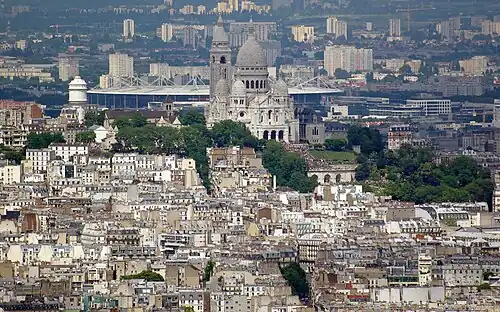 Vue de la tour Montparnasse avec le stade de France en fond.