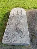 Pierre tombale de l'ancien cimertière.