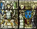 Trophée d'armes et deux anges présentant les armes de France.