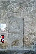Petite porte bouchée de la fin du XIe siècle.