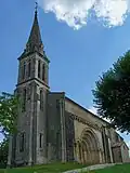 L'église Saint-Martin et son portail latéral (juin&nbsp;2009)