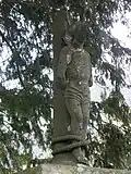 Chapelle Notre-Dame de Trévarn : statue de saint Sébastien au portail d'entrée de l'enclos paroissial.