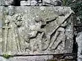 Le calvaire de Kerbreudeur, bas-relief de sainte Catherine d'Alexandrie et de saint Michel terrassant le dragon.