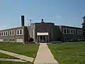 École
