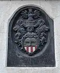 Armoiries au fronton d'un hôtel particulier à Bergün/Bravuogn