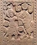 Homme en costume du nord-ouest, luttant contre des lions. (deuxième période, vers 15 av. J.-C.)