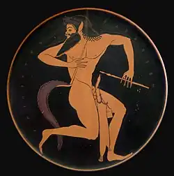 Satyre avec deux flûtes et un étui suspendu à sa verge, assiette à figures rouges, Paris, Bibliothèque nationale de France, Cabinet des médailles.