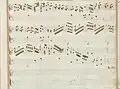 partition manuscrite aux couleurs passées rouge et bleu en bordures