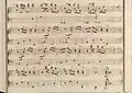 partition manuscrite aux couleurs passées rouge et vert en bordures
