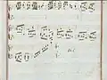 partition manuscrite rehaussée de couleurs passées rouge et bleu en bordures