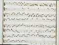 partition manuscrite rehaussée de couleurs passées rouge et vert en bordures