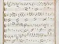 partition manuscrite rehaussée de couleurs passées vert et rouge en bordures