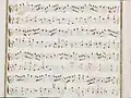 partition manuscrite aux couleurs passées rouge et vert en bordures
