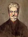Portrait peint en buste de face d'un homme aux yeux clairs et aux cheveux, barbiche et moustache grisonnants