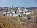 En 1133, le comte Adolphe II construit Schloss Burg sur une montagne surplombant le Wupper. C'est la résidence des comtes de Berg jusqu'au XIVe&nbsp;siècle.
