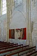 Arcade bouchée de la chapelle du sud.