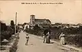 Le bourg vu de l'avenue de la Gare au début du XXe&nbsp;siècle (carte postale).