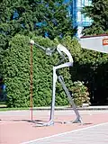 « Gnomon » moderne, extrémité à boule et pied virtuel.