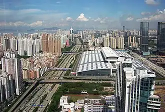 Shenzhen Convention and Exhibition Center (en), Shenzhen. Gerkan, Marg and Partners, (-2004)Point de vue, 2007.