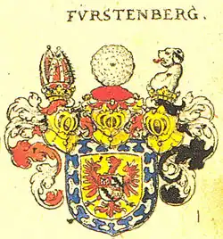 Armoiries des Fürstenberg : d'or, à la bordure nébulée d'argent sur azur, le champ ch. d'une aigle de gueules, becquée et membrée d'azur, ch. sur l'estomac d'un écusson écartelé : aux 1 et 4, de gueules, au gonfanon d'argent (Werdenberg); aux 2 et 3, d'argent, à la bande vivrée de sable (Heiligenberg). Cinq casques d'or, couronnés du même, excepté le troisième Source: Rietstap.