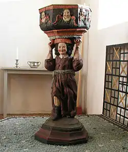 Fonts baptismaux du XVIe siècle, à l'église de Sjögestad (sv) en Suède.