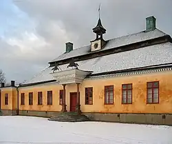 Manoir de Skogaholm (transplanté depuis le Närke) en hiver.