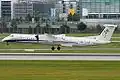 Bombardier Q400 de SkyWork Airlines en ancienne livrée
