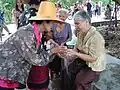 Respect aux personnes âgées, Wat Khung Taphao, Province d'Uttaradit