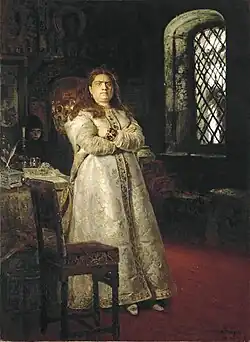 Portrait d'une femme, l'air sévère.
