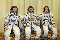 De gauche à droite : Robert Thirsk, Roman Romanenko, Frank De Winne