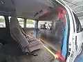 Aménagement d'un véhicule pour le transport de malades