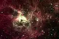 La nébuleuse de la Tarentule en infrarouge par le télescope spatial Spitzer. Certaines étoiles supergéantes bleues à l'intérieur de cette nébuleuse sont 100 fois plus massives que le Soleil et au moins 100 000 fois plus lumineuses.