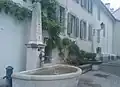 L'ancienne fontaine sur la place de la Libération.