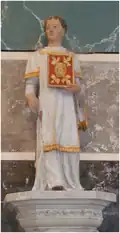 Dans le chœur, la statue en tilleul de saint Vallier, patron de la paroisse, XVIe&nbsp;siècle (ISMH 18/08/1985).