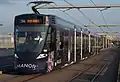 Une Stadler Tango aux couleurs de la marque Manor en 2014.