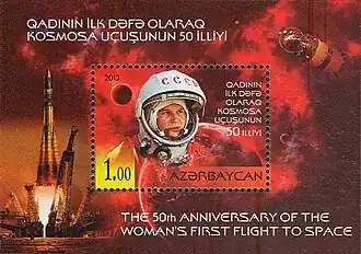 Timbre comportant une femme portant un costume de cosmonaute, il est écrit "the 50th anniversary of the woman's first flight to space"