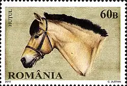 Timbre avec une tête de cheval dessinée.