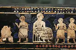 Mosaïque de pierres noires et blanches.