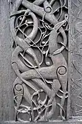 Portail nord sculpté de la Stavkirke d'Urnes.