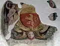 Morceaux de la fresque dans le Palazzo Pretorio, de la fin du XVIe&nbsp;siècle, représentant un lion d’or sur fond rouge, surmonté d’un aigle impérial, l’écusson du bas représente la face d’un des gouverneurs de Terra del Sole