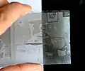 Démonstration de l'effet du fond noir sur un négatif stéréoscopique du début du XXe siècle (pas un ambrotype).